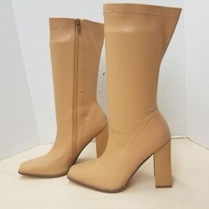 Women's new condition heel short boots size 8